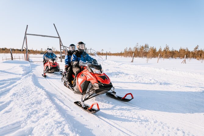 1 Hour Easy Snowmobile Safari in Levi - Through snowy forests and across frozen lakes
