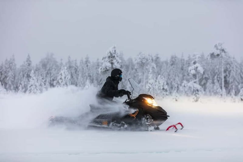 3-hour snowmobiling adventure in Levi - Getting dressed for three hours outside