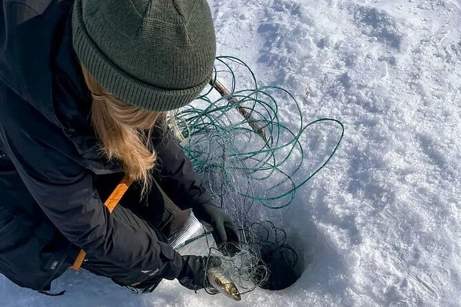 Arctic Fishing & Open Fire Cooking - What this Lake Inari outing is really about