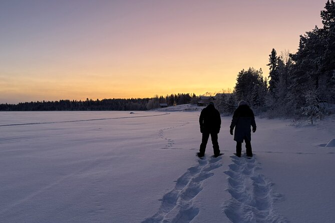 Arctic Reindeer Farm Experience with Snowshoeing in the Wild - Snowshoes across the frozen lake