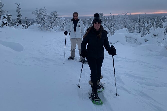Arctic Reindeer Farm Experience with Snowshoeing in the Wild - A warm cabin finish with sausages and pastries