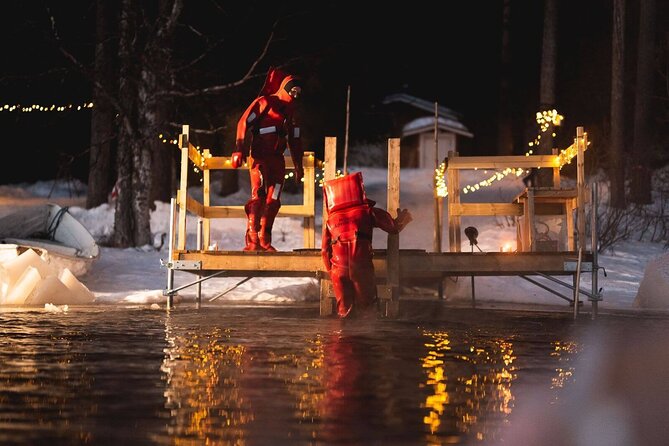 Aurora Arctic Ice Floating in Rovaniemi, Small-group - Warming up by the fire