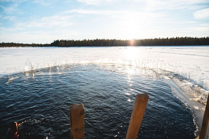 Daytime Arctic Ice-Floating in Rovaniemi, Small-Group - Fire, hot drinks, and the best part of warming up