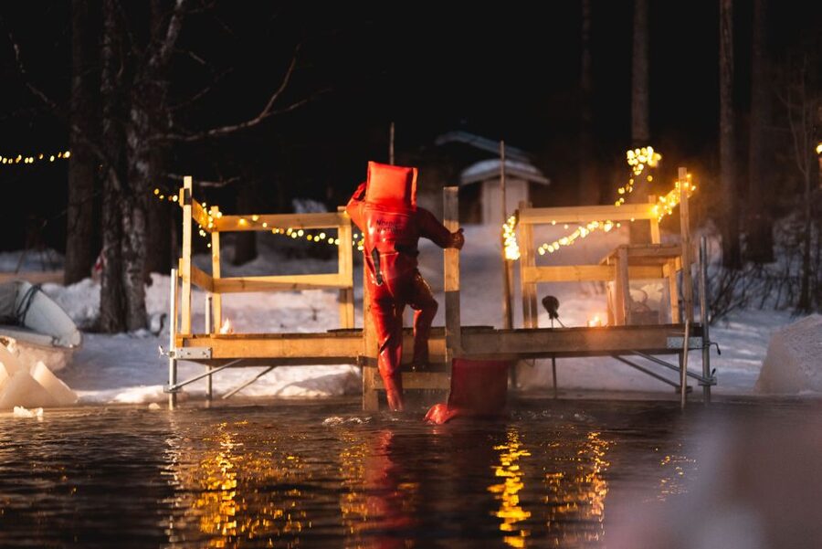 Daytime Ice Floating Rovaniemi, Frozen Lake Experience - Fire, cookies, and the cottage afterward