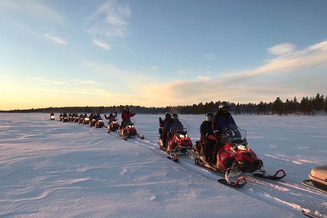 Easy Snowmobile Safari - Crossing the frozen river first