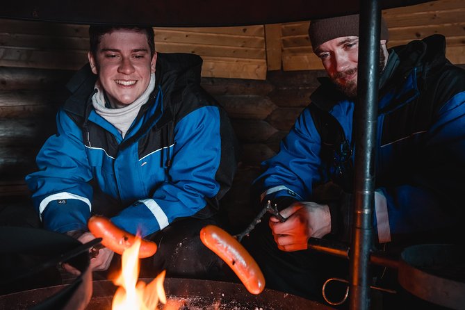Evening Escape - Snowmobile safari and campfire in Rovaniemi - The campfire stop in the quiet forest
