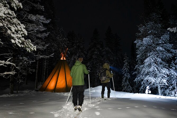 Evening Ski Trek to the Wilderness - Extra Small group - Warming up inside the kota