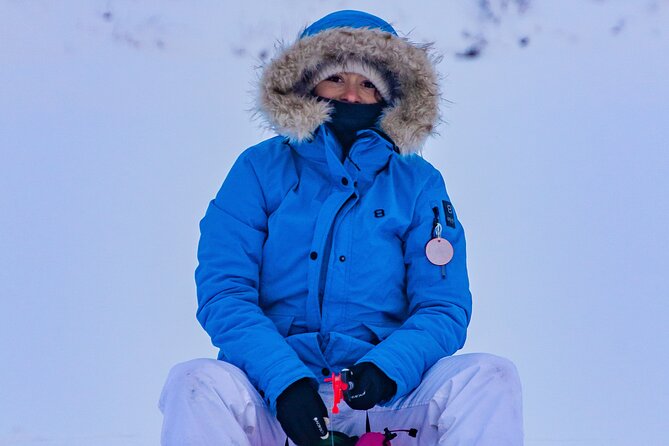First Ice Fishing Experience in Rovaniemi - Finnish snacks around the open fire