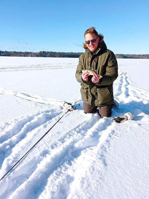 From Helsinki: Bodom Lake Ice Fishing with Food & Drinks - Drilling the hole and using a pilkki