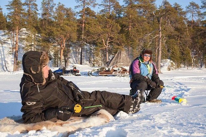 From Kakslauttanen: Ice Fishing Safari to Lake Inari, inc. lunch - Fishing on the frozen lake