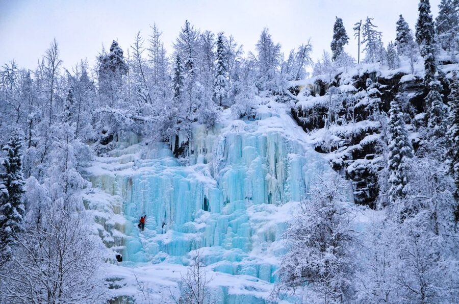 From Rovaniemi: Korouoma Canyon and Frozen Waterfalls Tour - A Finnish campfire, sausage, and hot chocolate