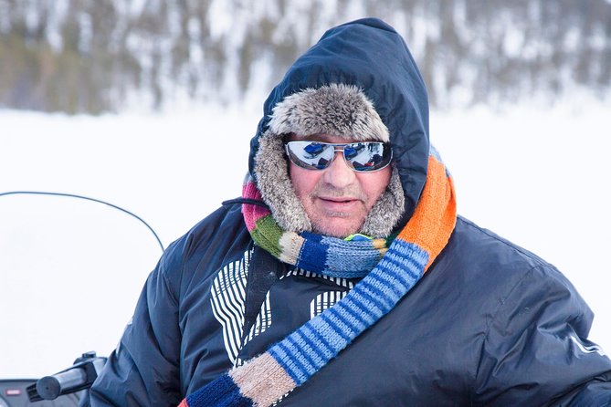 From Saariselkä: Ice Fishing Tour to Lake Inari, reindeers &lunch - Learning the simple craft of ice fishing