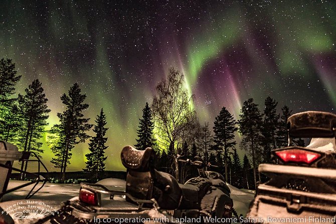 Hunting Northern Lights by Snowmobiles - Campfire stories and local mythology