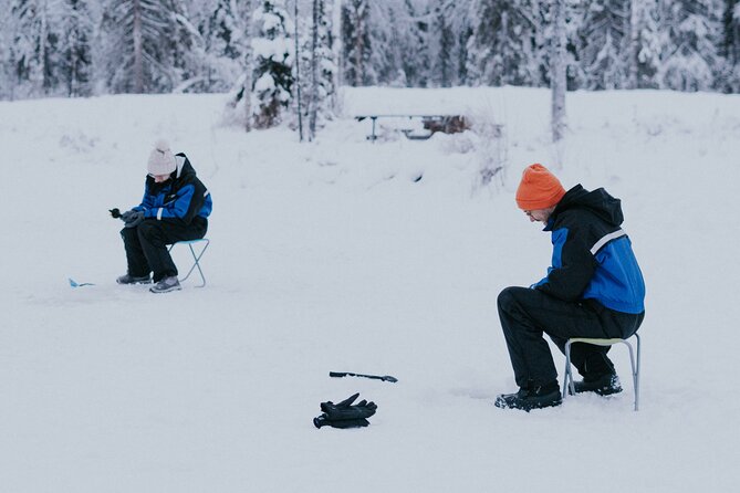 Ice Fishing by Snowmobile in Levi - Sausages and warm drinks are more important than they sound