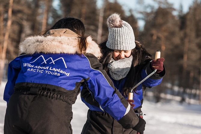 Ice Fishing Tour - The fire, teepee, sausages, and hot drinks