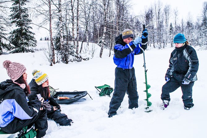 Ice Fishing Trip in Rovaniemi - Blue skies, frozen water, and the waiting game
