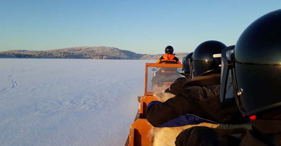 Ivalo: Ice Fishing Tour to Lake Inari, Reindeers & Lunch - From Ivalo to Koppelo in supplied winter gear