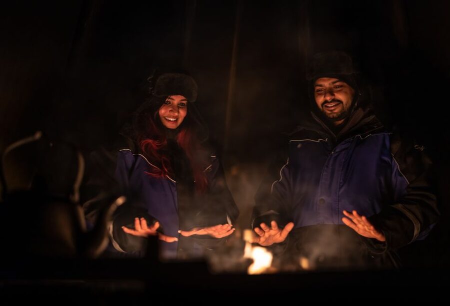 Ivalo: Lake Inari Northern Lights Tour w/ Reindeer & Dinner - The sleigh ride across frozen Lake Inari