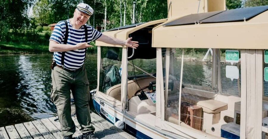 Lake Saimaa story cruise by Ecoboat in Puumala - Captain Arto turns views into a local story