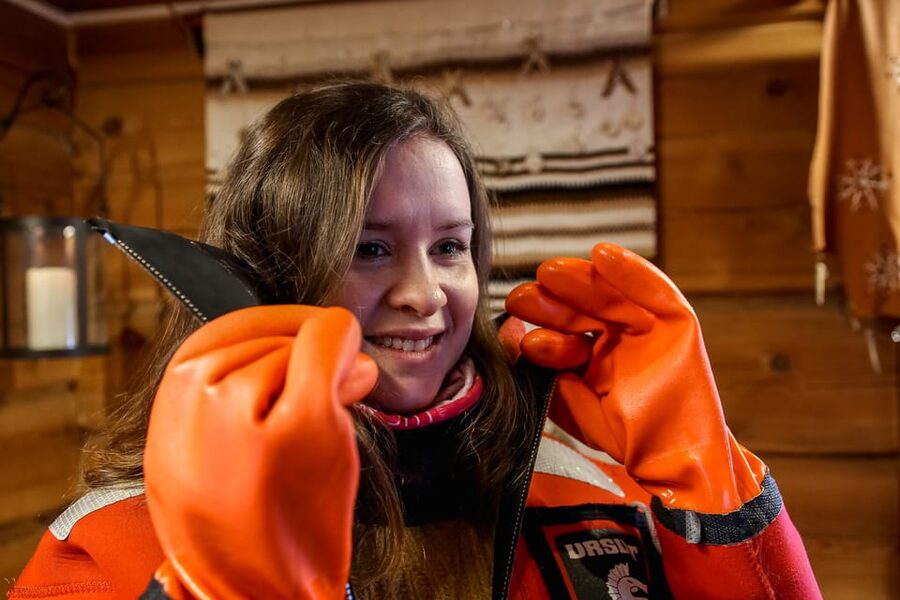 Levi: Arctic Ice Floating Adventure - Warming up beside the open fire