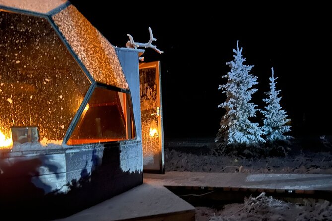Northern Lights dinner in a Glass Igloo - Snowmobiles and the frozen lake