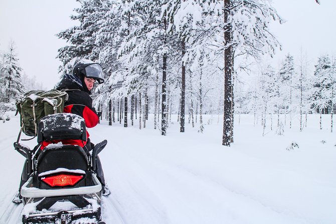 Northern Lights Snowmobile Driving Safari - Leaving Rovaniemi in the winter dark