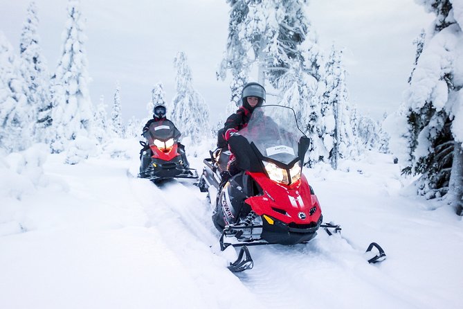 Northern Lights Snowmobile Driving Safari - The wooden tepee and the fire
