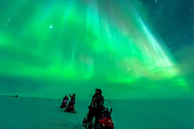 Northern Lights Snowmobile Safari from Rovaniemi with Campfire Picnic - Sausages, hot drinks, and a Lapland campfire