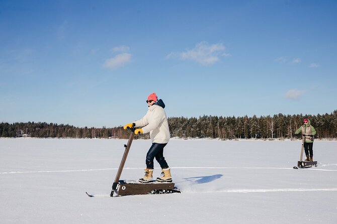 Private Driving Snow Scooters Experience in Finland - Learning the eLyly before the real ride