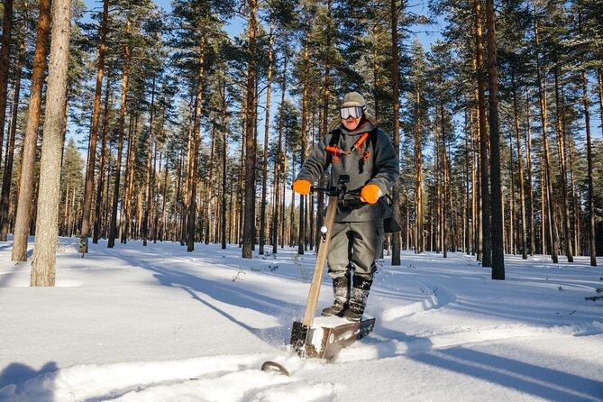 Private Driving Snow Scooters Experience in Finland - A hot drink and time for photos