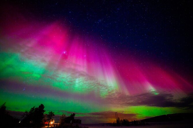 Private Group: Northern Lights Hunt 4x4 SUV with Aurora guarantee - Fires, sausages, and the Arctic setting