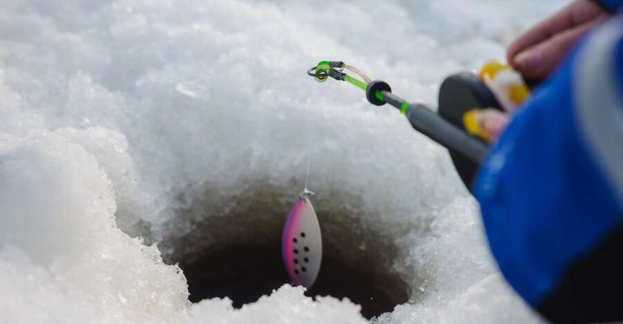Rovaniemi: Arctic Circle Ice Fishing Experience - Drilling the ice and learning the old method