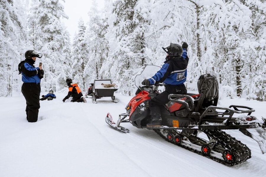 Rovaniemi: Family Snowmobile Safari with Campfire and Snacks - Getting suited up at the Wild Nordic center