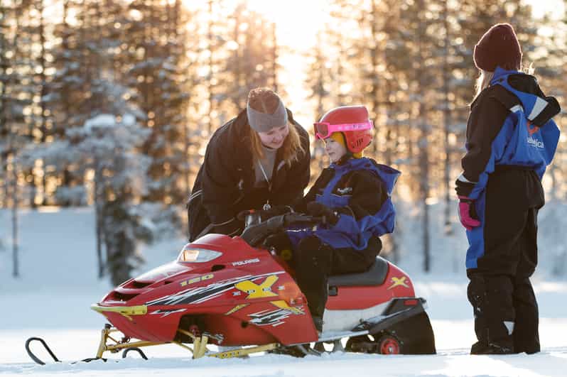 Rovaniemi: Family Snowmobile Trip with Guide and Picnic - Campfire food in the Lappish wilderness