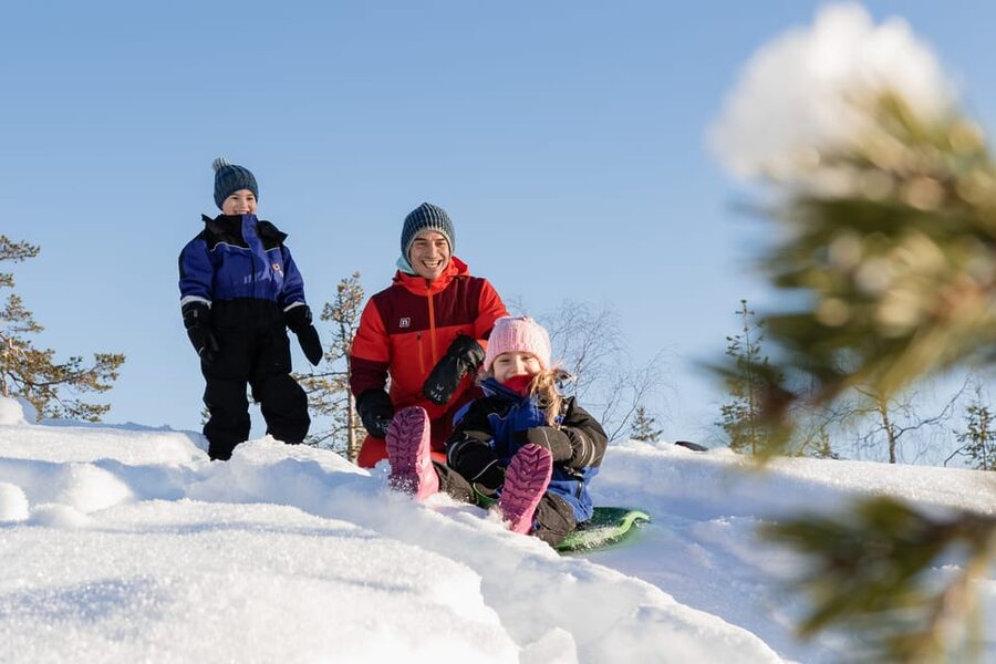 Rovaniemi: Family Snowmobile Trip with Guide and Picnic - Getting ready for your snowmobile ride