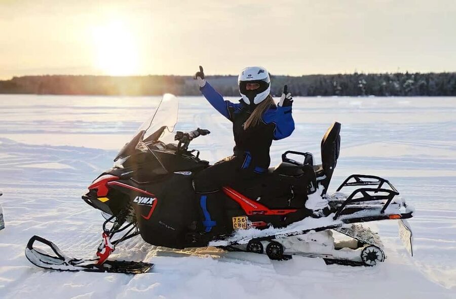 Rovaniemi: Guided Wilderness Snowmobile Safari & Barbeque - The first run across the frozen lake