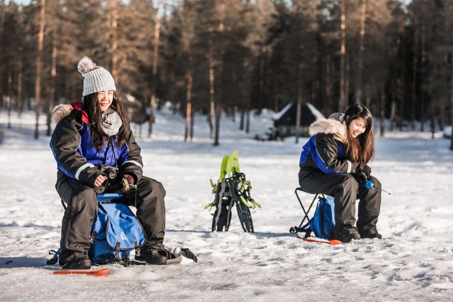 Rovaniemi: Ice Fishing Experience - Walking through the old forest to the frozen lake