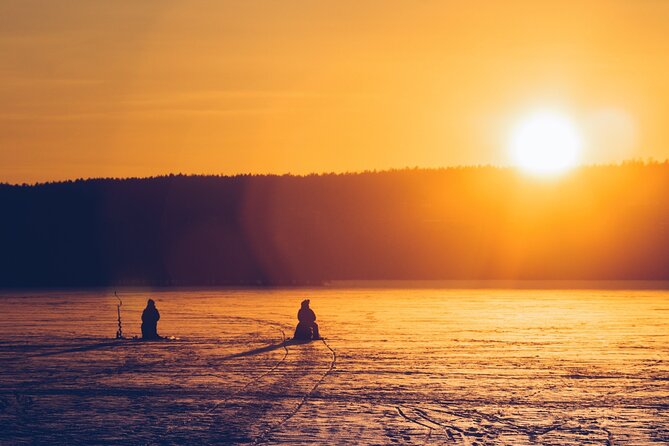 Rovaniemi: Ice Fishing from Private Lakefront Property & BBQ - Standing on the frozen lake