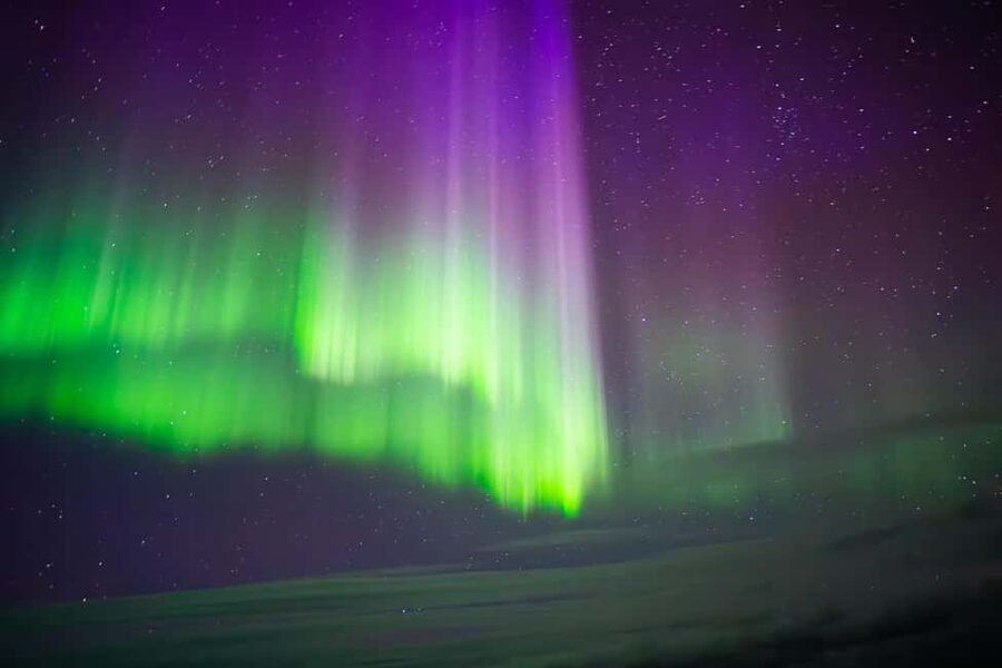 Rovaniemi: Ice Floating Experience with Northern lights - Getting into the thermal survival wetsuit