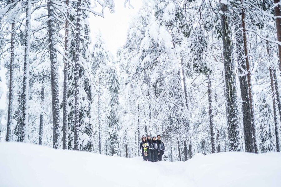 Rovaniemi: Nordic Forest Wilderness Adventure - Warm clothing, boots, a backpack, and hot drinks