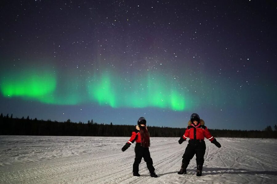 Rovaniemi: Northern Lights Sleigh Ride - Leaving Rovaniemi by snowmobile sleigh