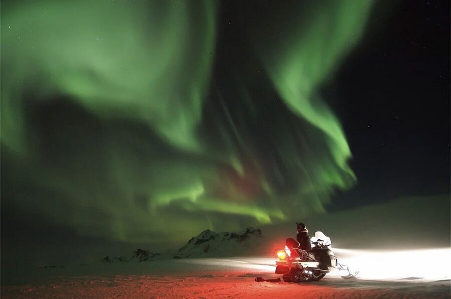 Rovaniemi: Northern Lights Snowmobile Hunt - Riding into the Arctic night from Rovaniemi