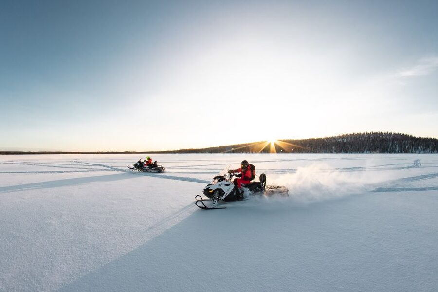 Rovaniemi: Snowmobile and Ice Fishing Adventure with Lunch - Learning to fish through solid ice