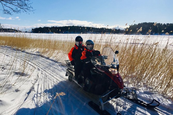 Snowmobile Safari in Helsinki Archipelago with Lunch - Ice fishing and kick sledding