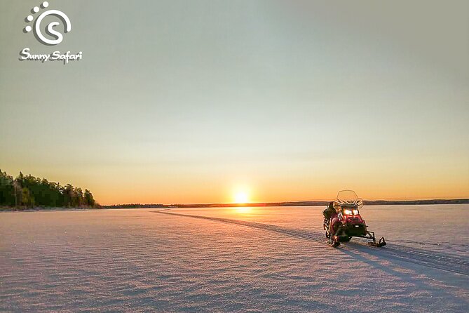 Snowmobile Safari into Arctic Wilderness - The halfway stop: photos, hot berry drink, and cookies