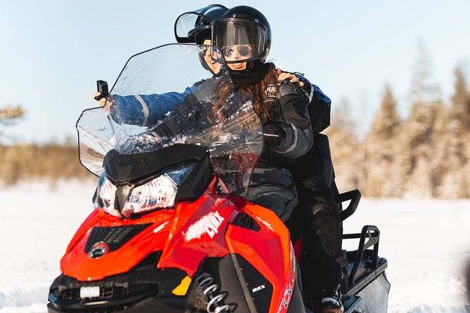 Snowmobile Safari into the Arctic Circle Forest - Riding two per snowmobile