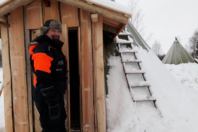 Snowmobile Safari to Lake Inari, meet & feed Reindeers, Lunch - Fire-cooked lunch inside the teepee