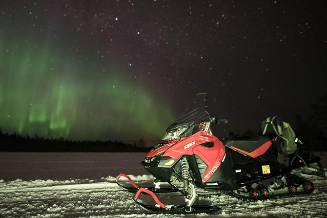Snowmobile Safari to Search for the Northern Lights - Sharing a snowmobile on the forest trails