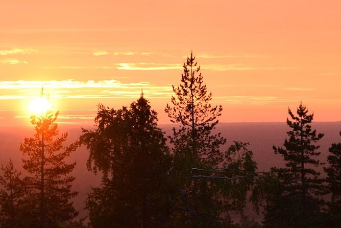 Sunset at the Arctic Circle - Watching sunset light from the wooden tower