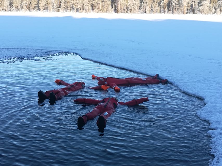 Ylläs: Lake Ylläsjärvi Ice-Floating Experience - Getting Ready in a Rescue Suit